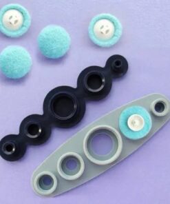 Šuvēja rokdarbu aptverto pogu veidotājs